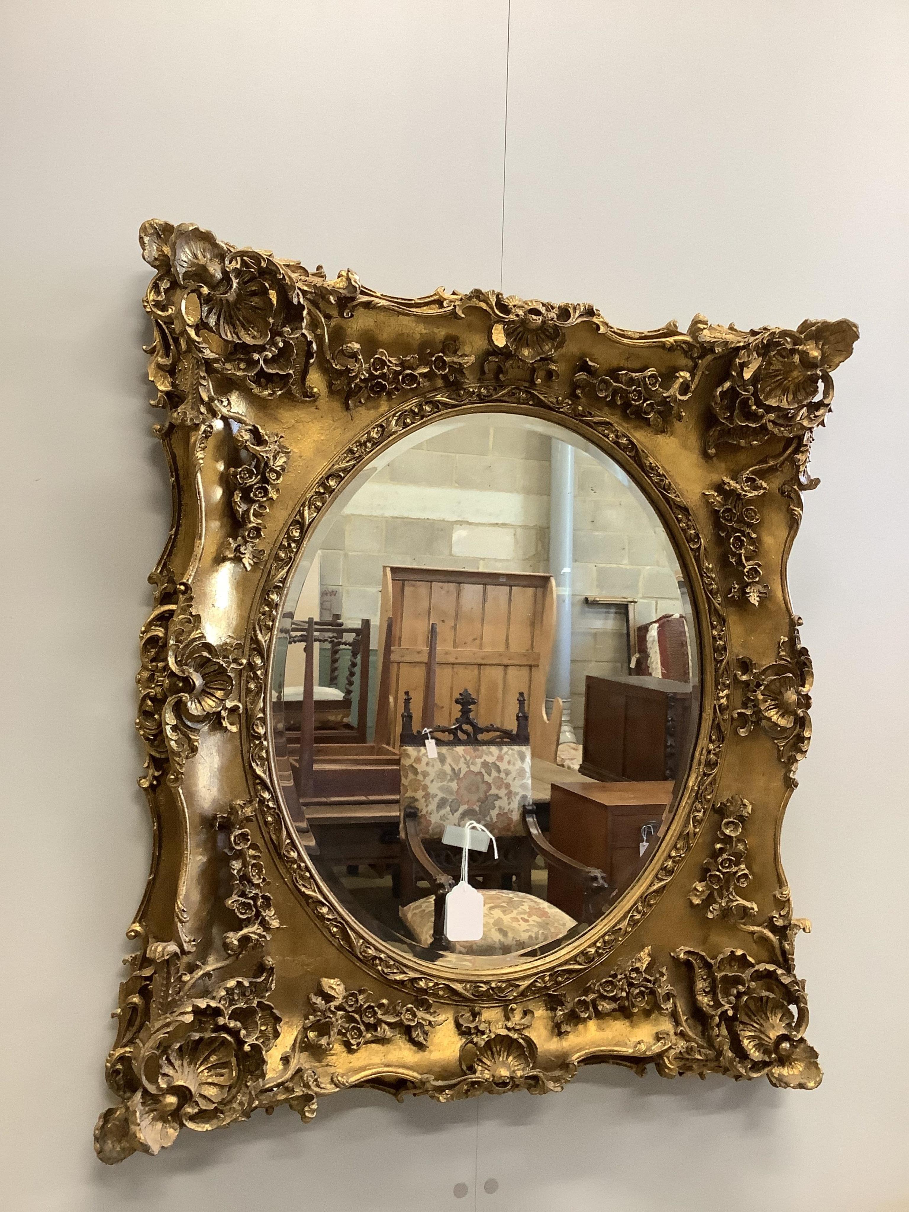 A pair of Victorian style gilt composition and faux marble wall mirrors, width 51cm, height 82cm, together with a similar larger mirror, width 77cm, height 87cm
